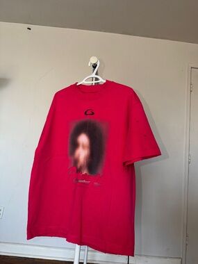 Bright Pink Graphic Tee with Blurred Portrait